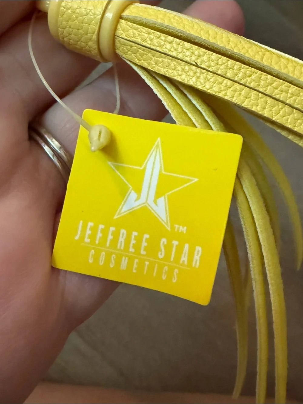 Jeffree Star F*CK Proof Yellow Braided Leather Tassel Mascara w/charm
